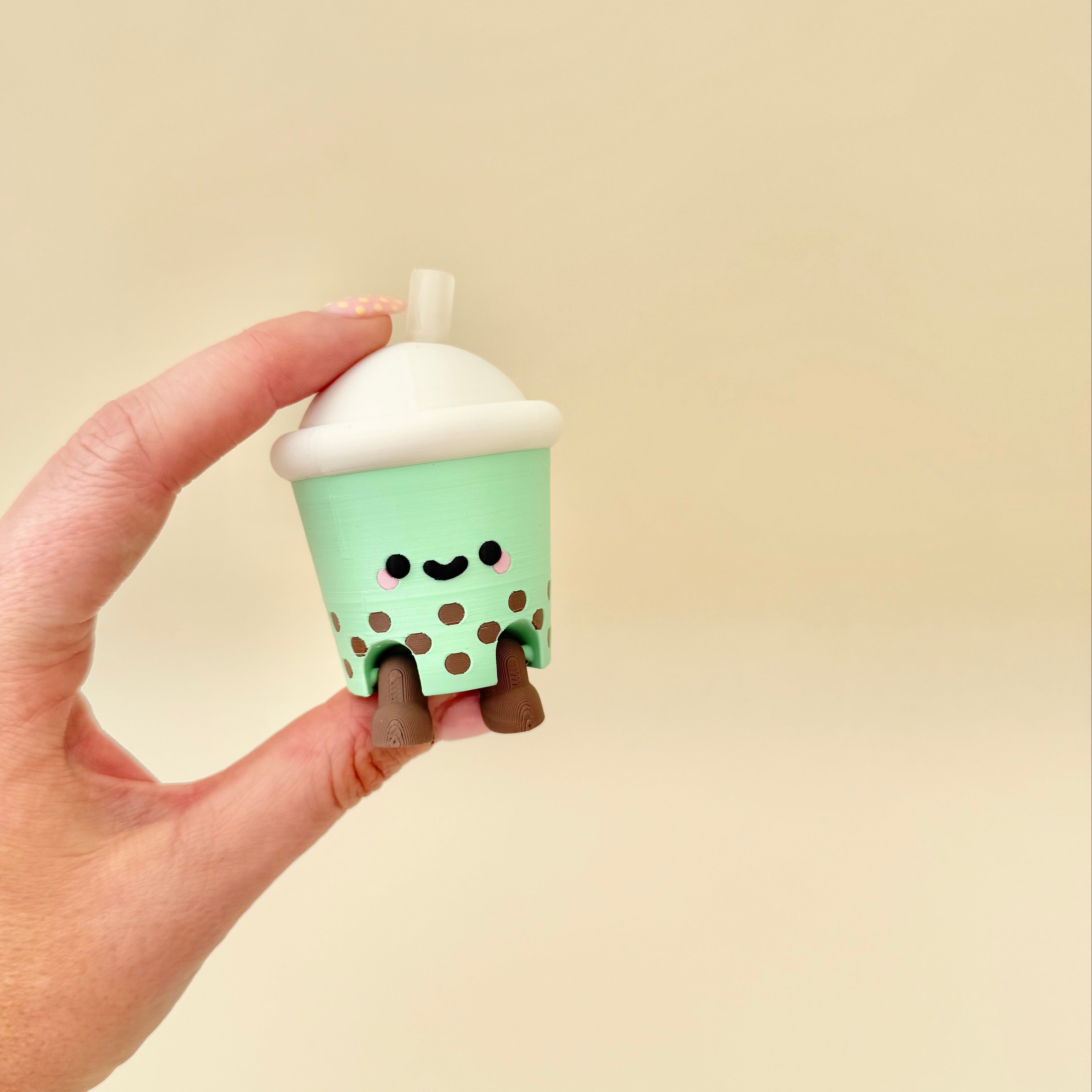 Small cute drink-themed sensory fidget designed for calming clicks, focus breaks, and neurodivergent stimming.
