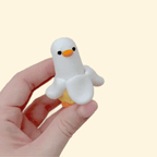 Compact press-style clicker fidget made for repetitive clicking, grounding movement, and everyday sensory use.
