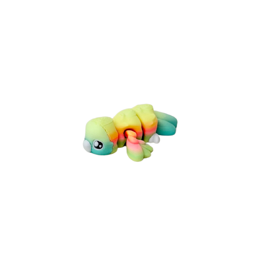 Collectible mini pet fidget for sensory play, designed for busy hands, focus breaks and calming stims on the go.
