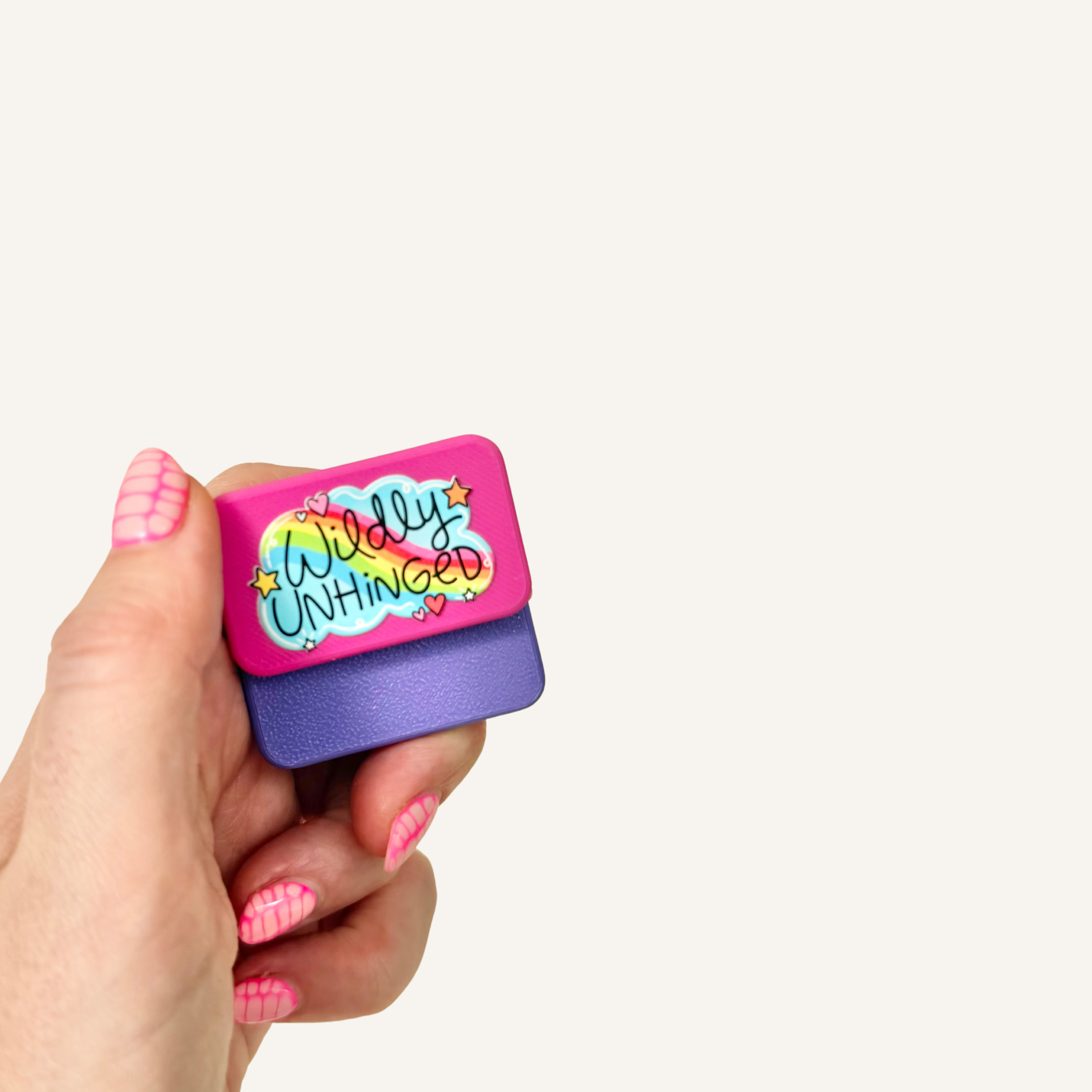 Two matching tactile magnets with raised artwork for satisfying everyday magnetic fidgeting.
