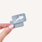 Compact magnetic sensory fidget pair with tactile whale shark artwork.
