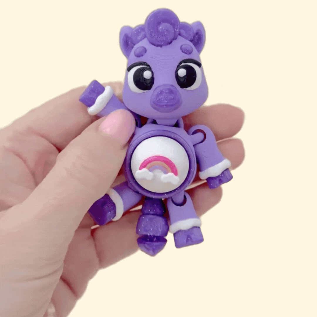Handheld press-click sensory fidget with cute character design, custom tummy icon options and satisfying movement.
