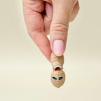 Lightweight handheld fidget designed for casual use, humour, and low-effort sensory engagement.
