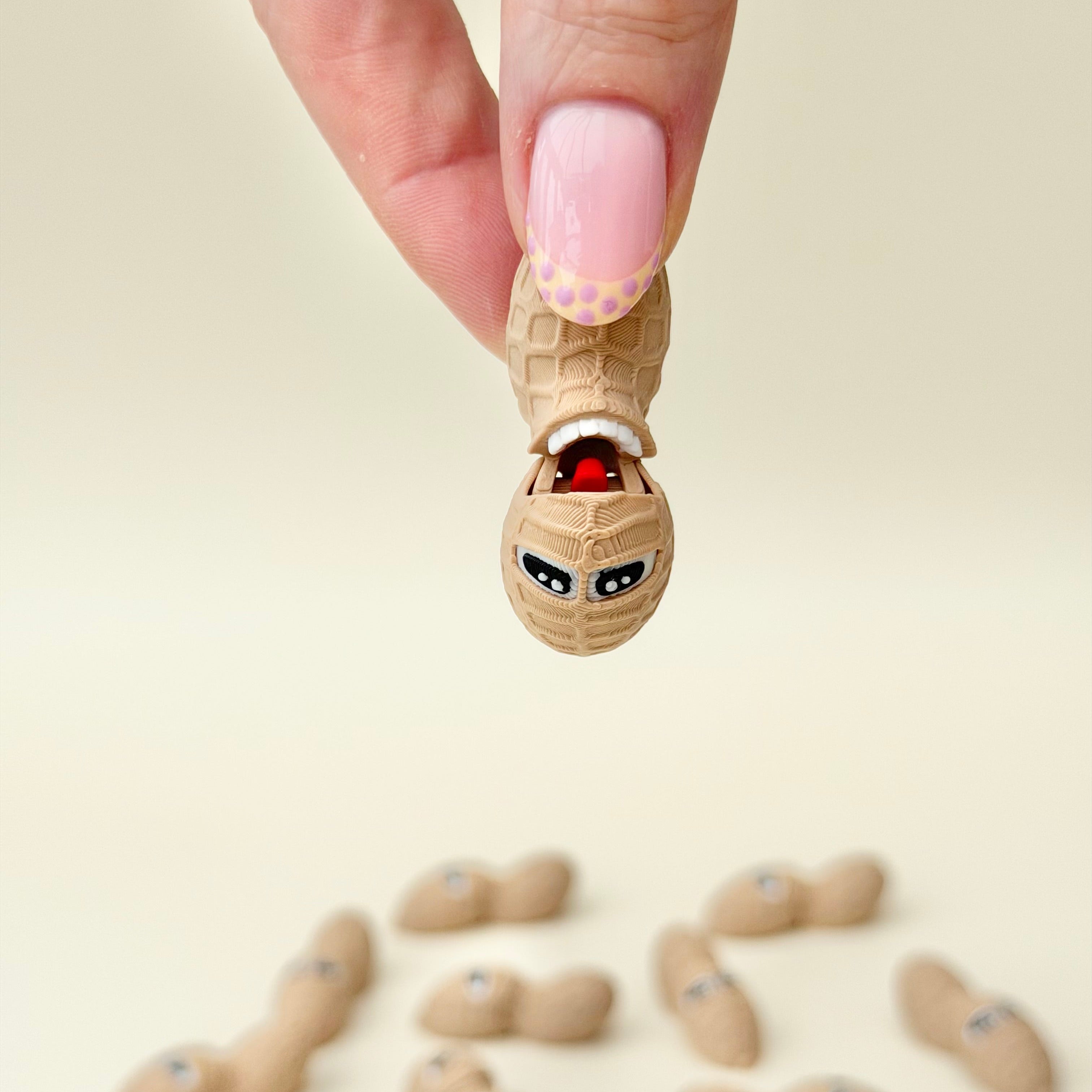 Pocket-sized sensory toy offering gentle movement for busy hands without strong noise or resistance.
