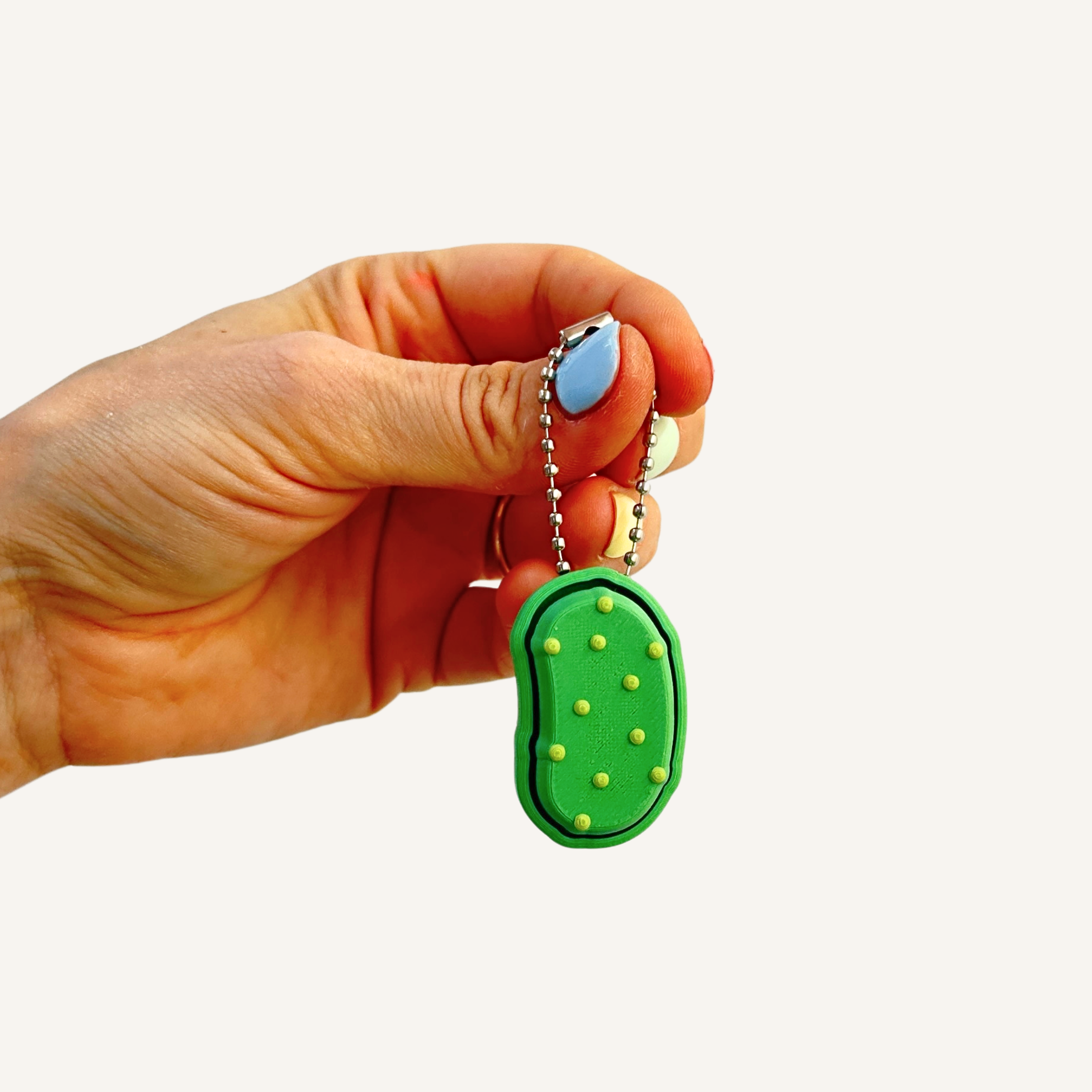Pickle-themed sensory fidget designed for busy hands and everyday tactile input.