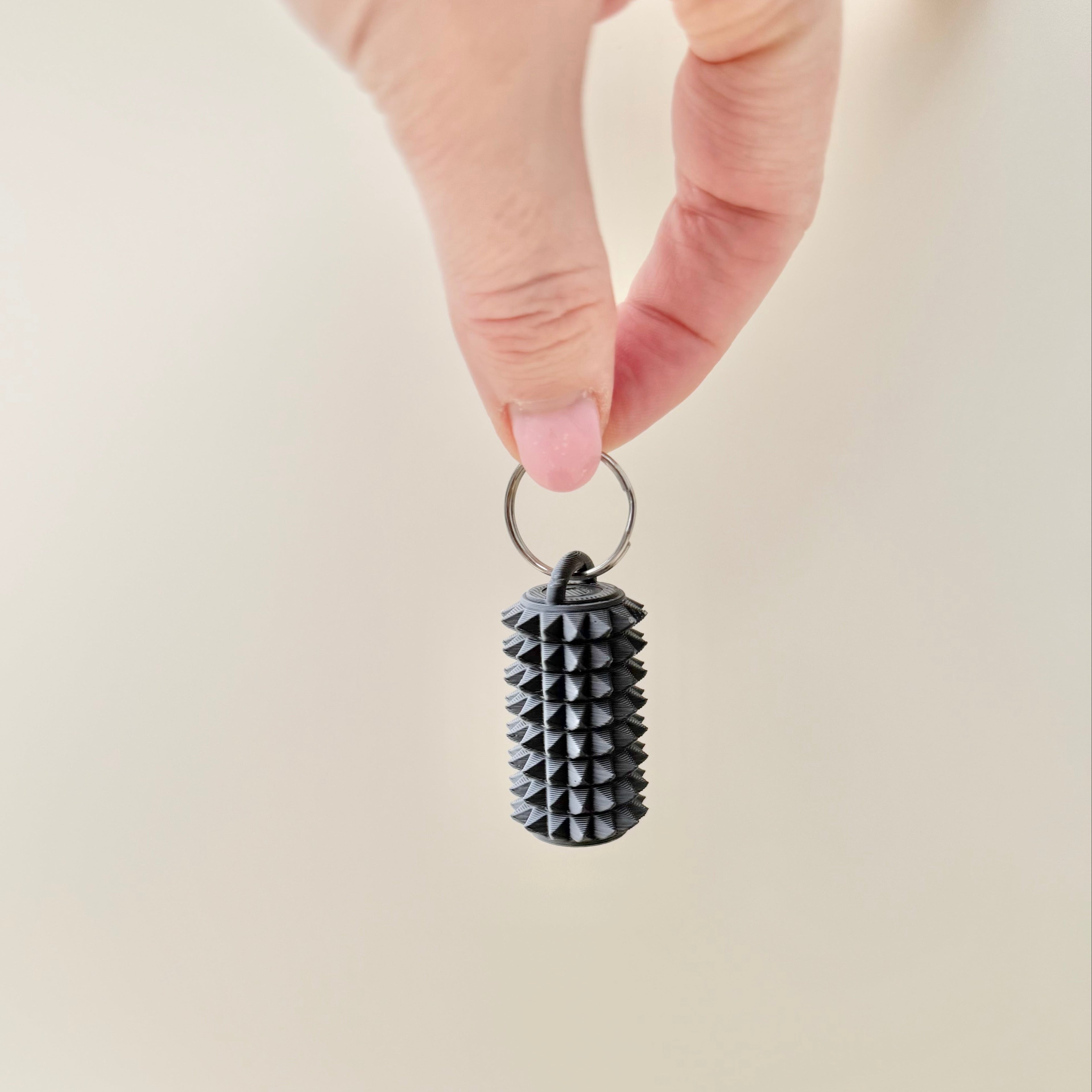 Small handheld sensory tool with firm texture, suitable for discreet everyday use.