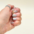 Spiky sensory fidget add-on with raised texture for tactile feedback and pressure stimming, quick to grab on a lanyard.