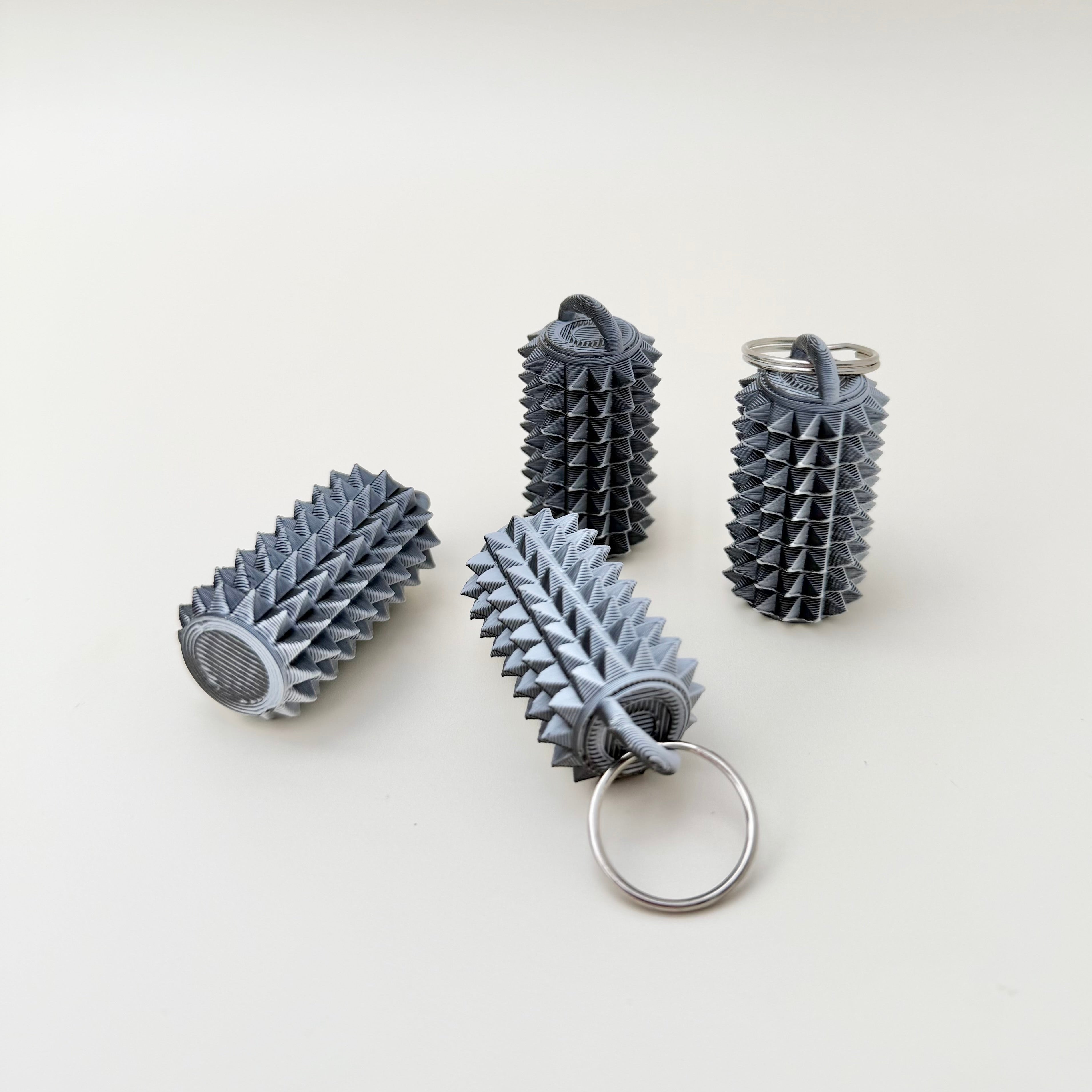 Textured pocket-sized fidget designed for squeezing, pressing, and tactile regulation.