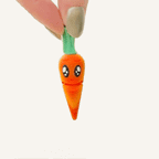 Tiny carrot fidget with a simple mouth movement for repetitive hand play, gifting and easy everyday use.
