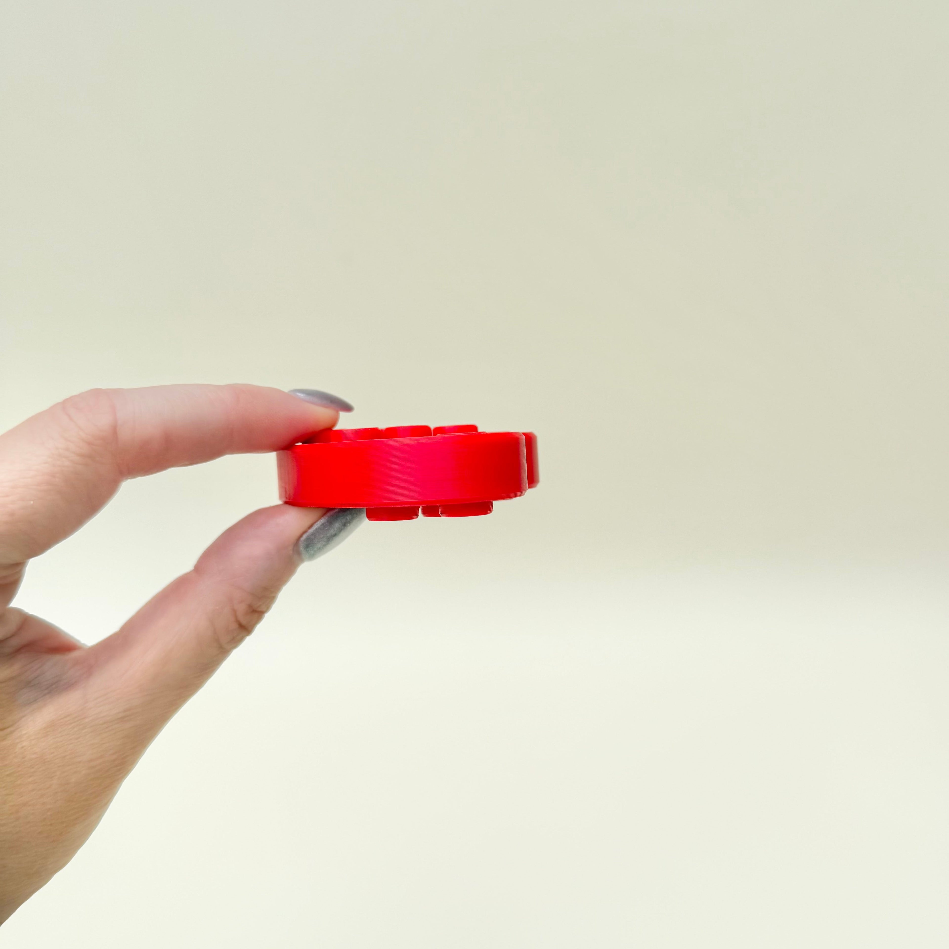 Lightweight portable sensory tool for quiet engagement and stress relief on the go.
