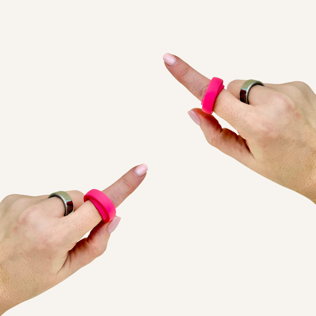 A compact wearable fidget tool designed for busy hands and low effort movement