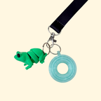 Lightweight articulated charm for lanyards, designed for busy hands, calming movement and quiet fidgeting.

