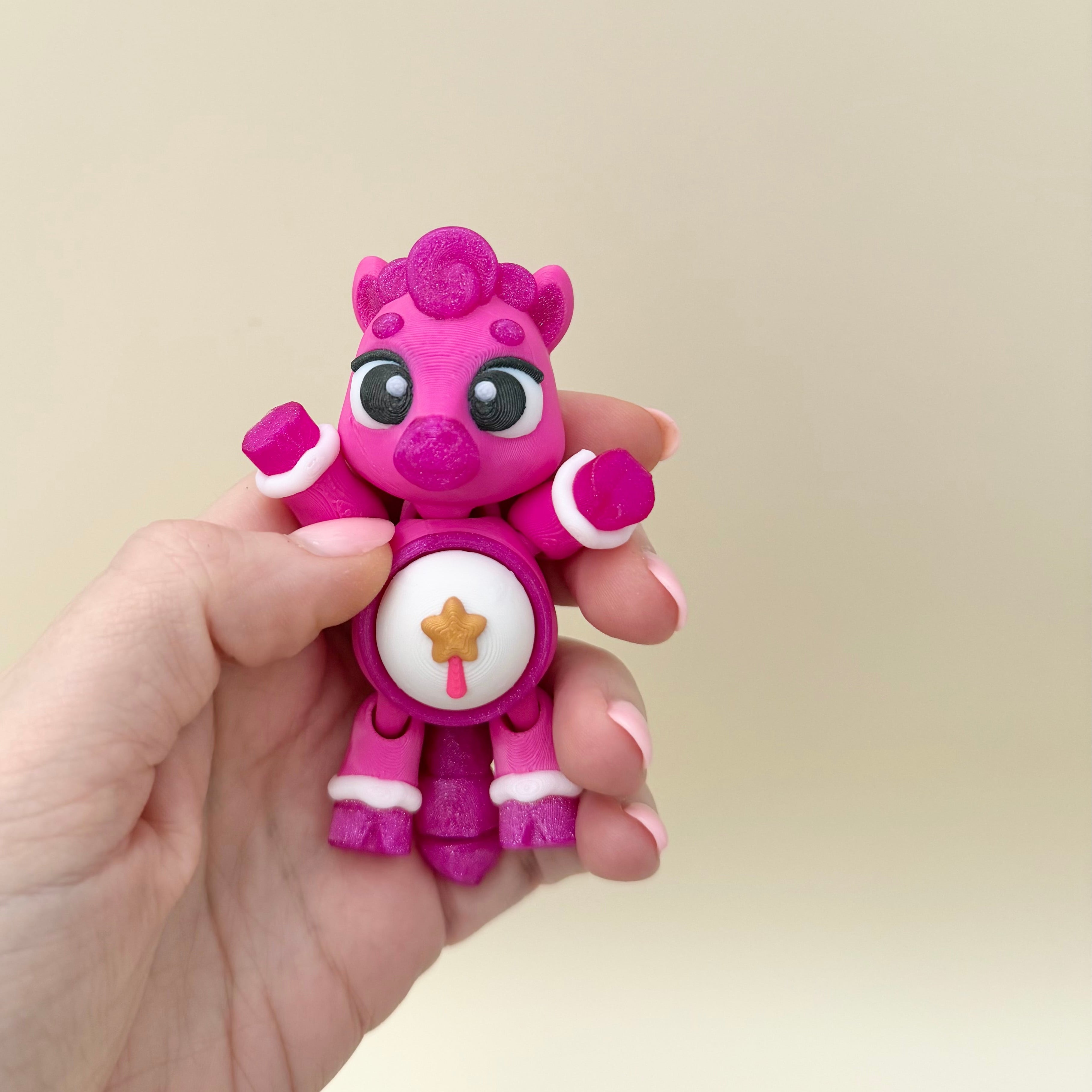 Flexi horse and unicorn clicker fidget with a press-down button and optional quiet click upgrade.
