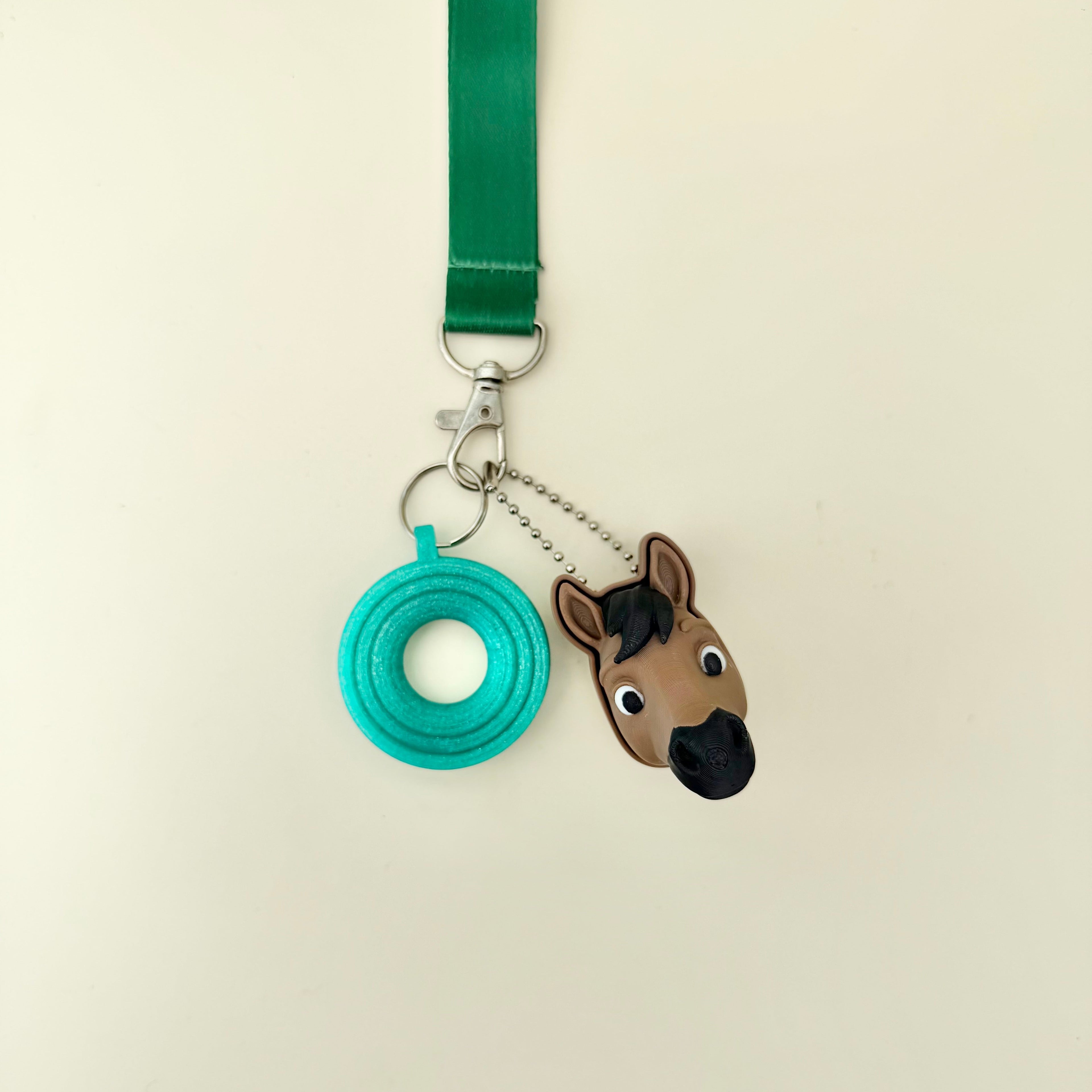 Small horse head fidget with click or quiet click option for grounding, stimming and sensory regulation.