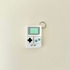 Retro-style clicker designed for sensory play on the go.