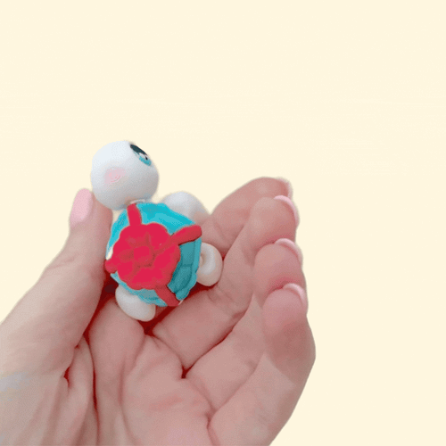 Mini turtle fidget with movable parts, tactile sensory toy designed for stress relief, focus, and small present ideas
