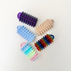 Deep pressure tactile fidgets in a mixed set for sensory regulation and stress relief.
