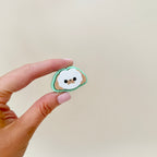 compact clicker button with raised details
