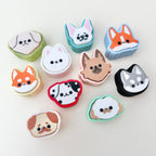 collection of pocket-sized clickers arranged for product display