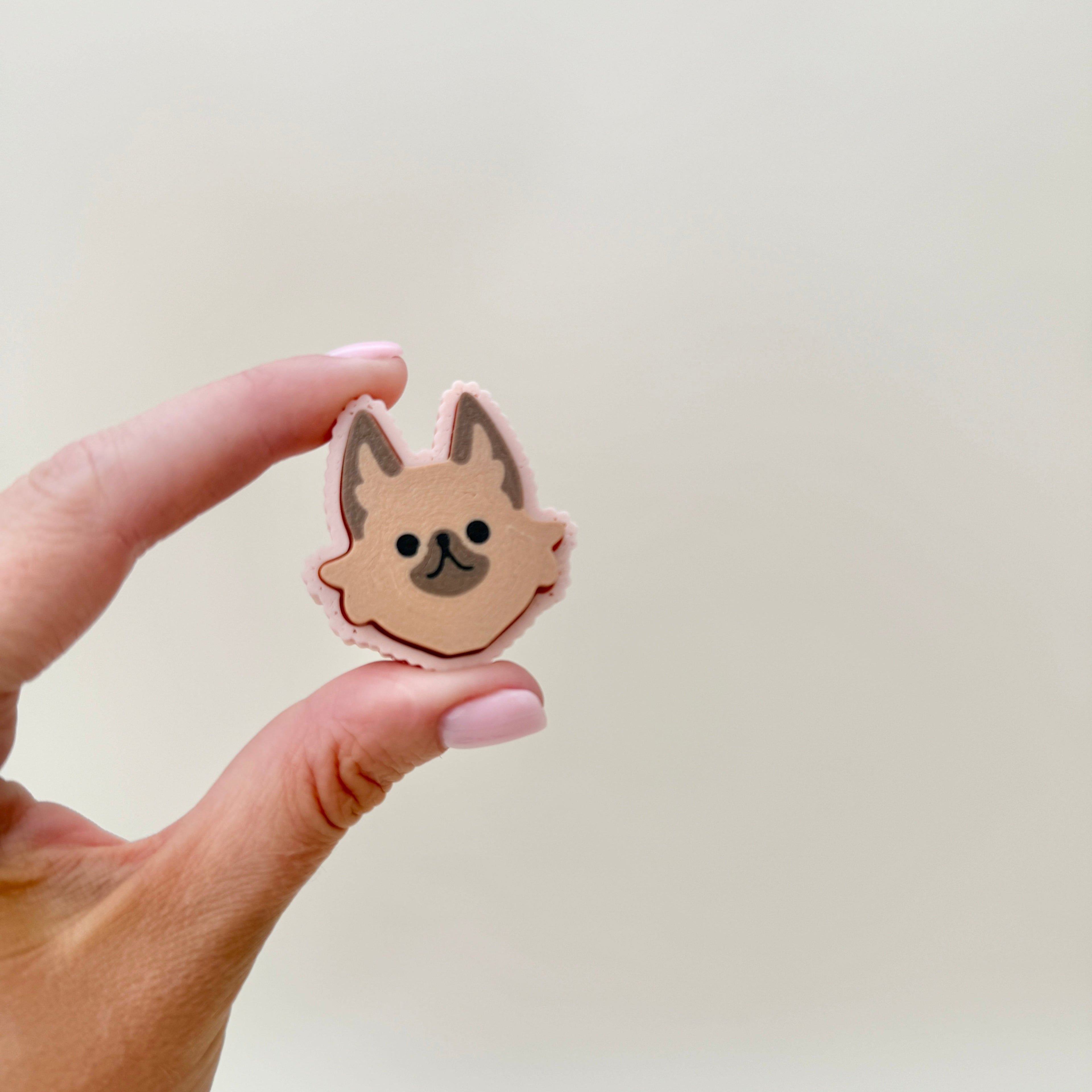 portable clicker with attachment loop for keys or bags
