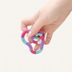 Soft flocked sensory fidget that twists and turns smoothly one-handed, great for discreet desk or classroom use.
