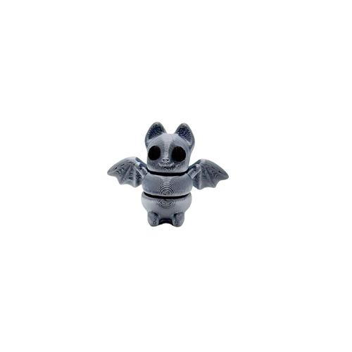 Tiny hand fidget with low-noise wiggle for sensory regulation
