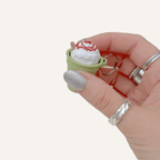 Clip-on sensory clicker with realistic drink design, tactile textures and optional quiet click.
