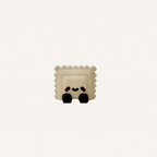Cute mini ravioli character with textured edges and dangling legs designed for desks, shelves and calm decor spaces
