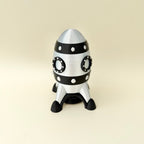 Mini articulated turtle fidget with space-themed finish designed for tactile play and everyday fidgeting