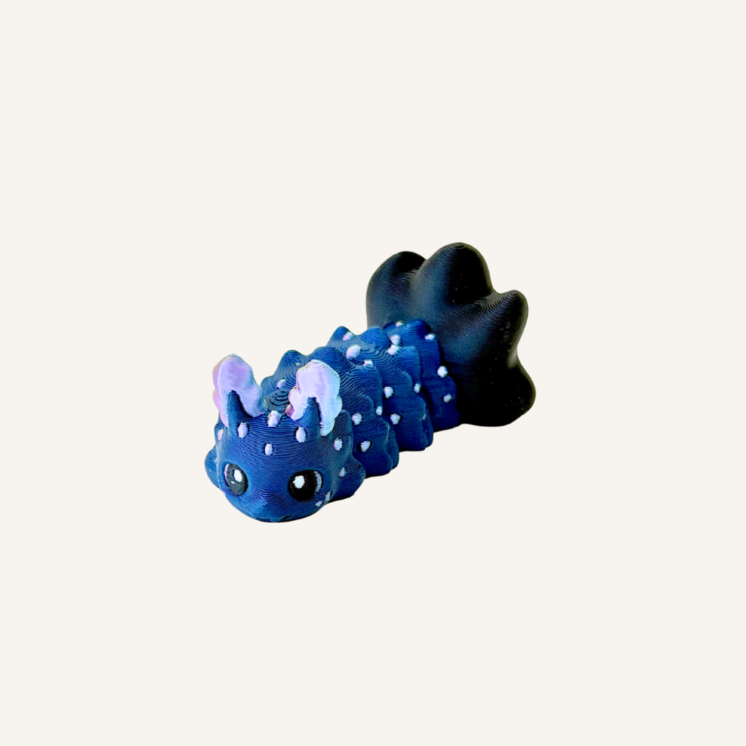 Mini articulated sea bunny fidget with smooth movement and light texture for pocket sensory use.

