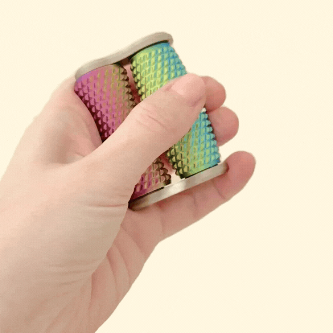 A colour-changing, dual-roller fidget toy with deep texture for sensory stimulation.