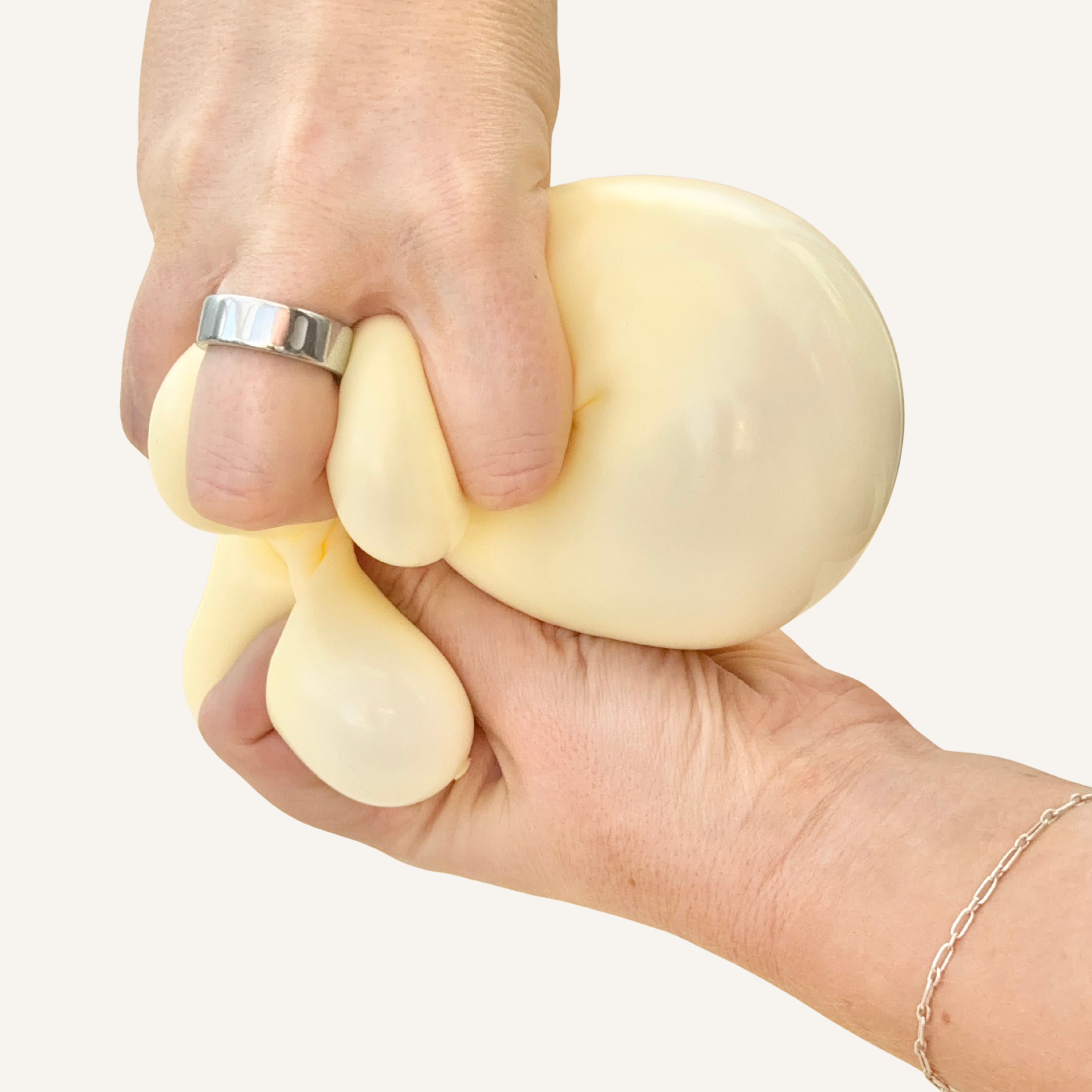 Large cheese-shaped sensory squish with a soft gel filling and tacky grip.