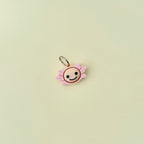 Tactile fidget tool with soft edges and pressable centre.