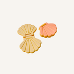 Pocket-sized seashell fidget with smooth flip action for busy hands.