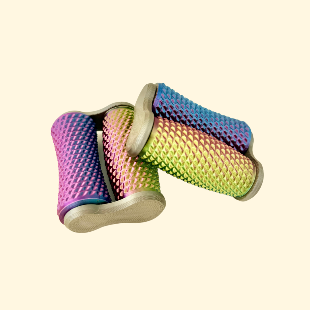 A smooth-spinning, textured roller fidget toy designed for quiet play and focus.