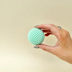 Compact firm sensory ball created for discreet use in classrooms, workspaces or travel.
