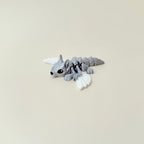 portable winged wolf toy suitable for neurodivergent users and collectors
