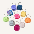 Customisable 1-tile clicker attachment with tactile texture choices and Click or Quiet Click options for lanyards.
