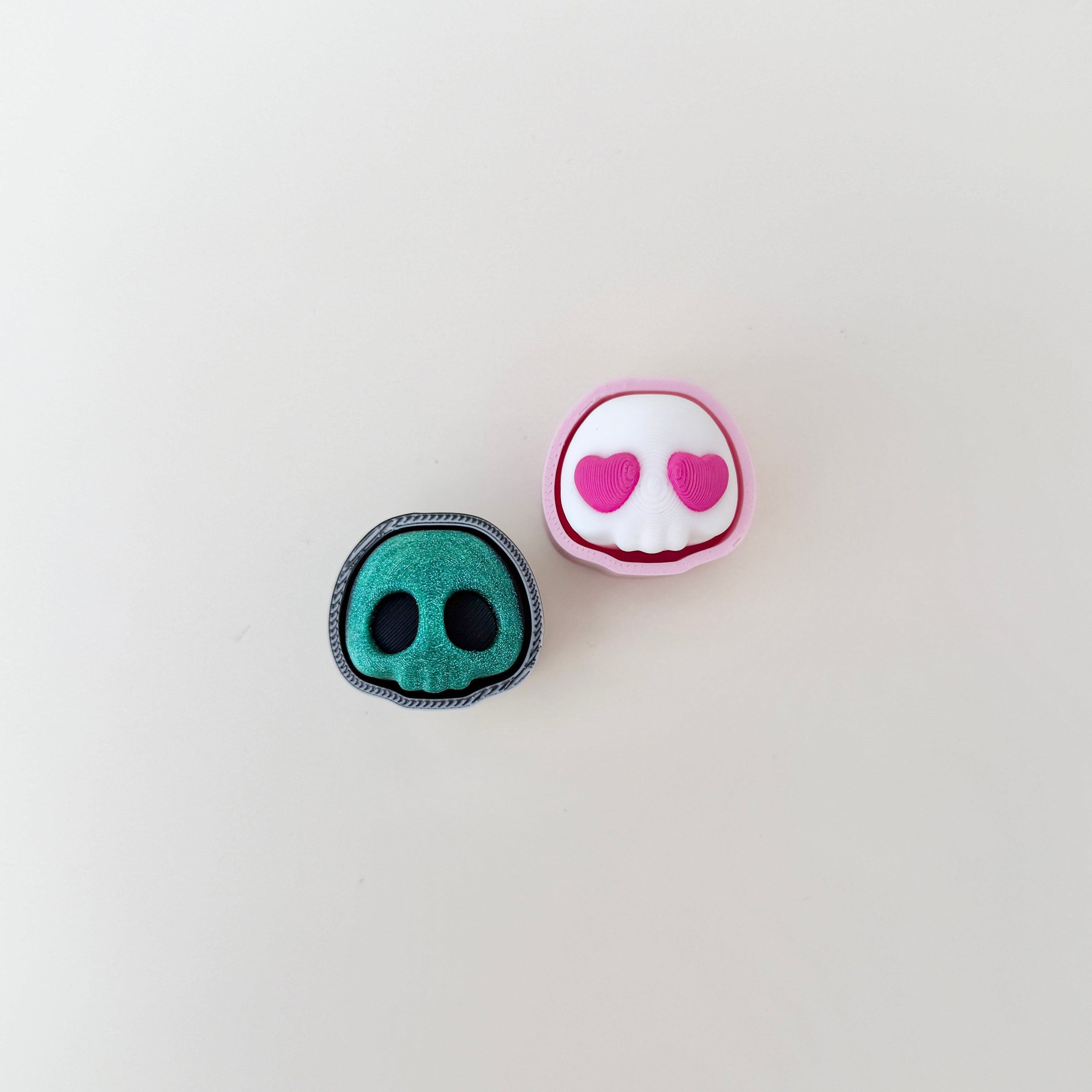small skull-shaped clicker fidget with textured surface for sensory play
