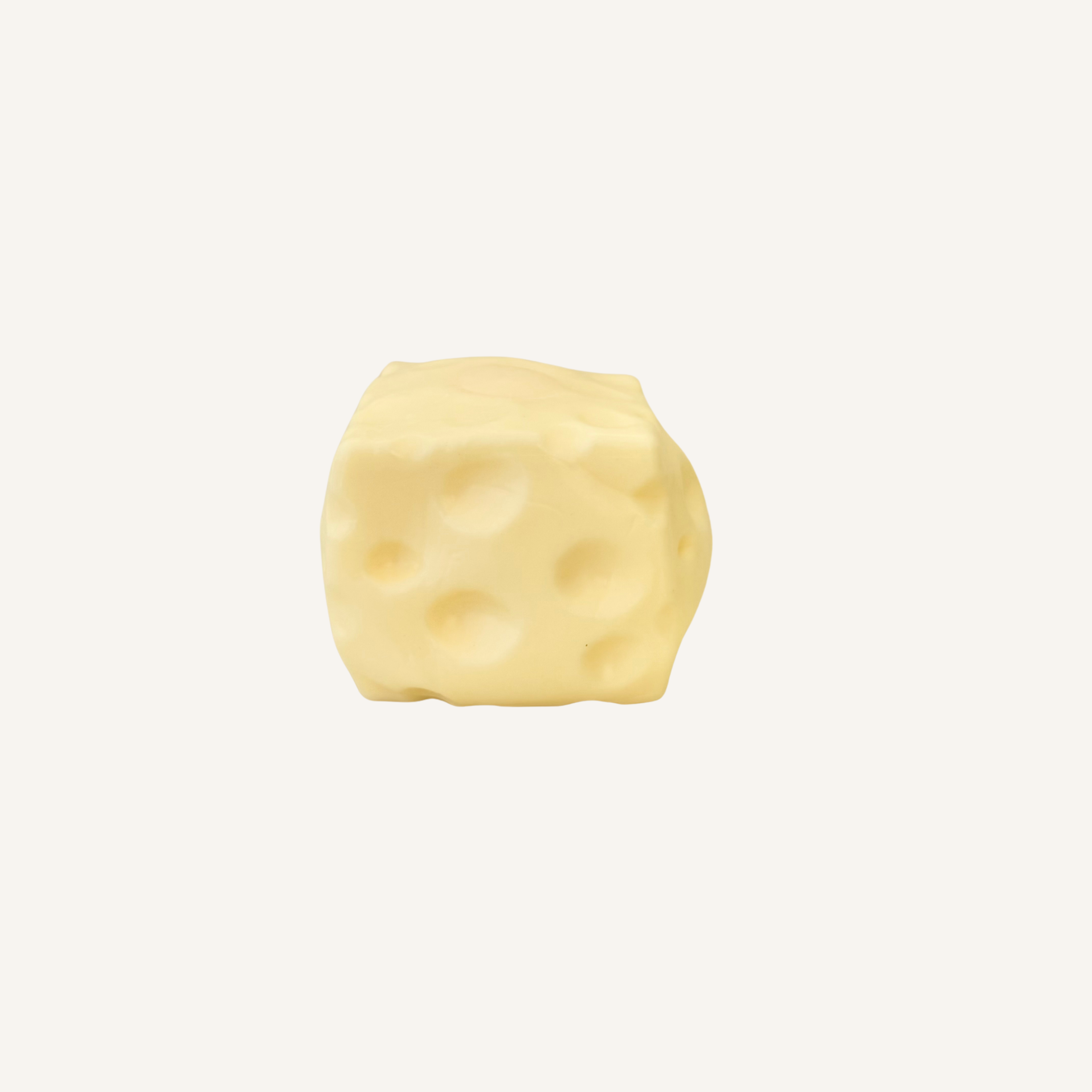 Chunky cheese squish designed for slow, satisfying squeezes and tactile sensory input.