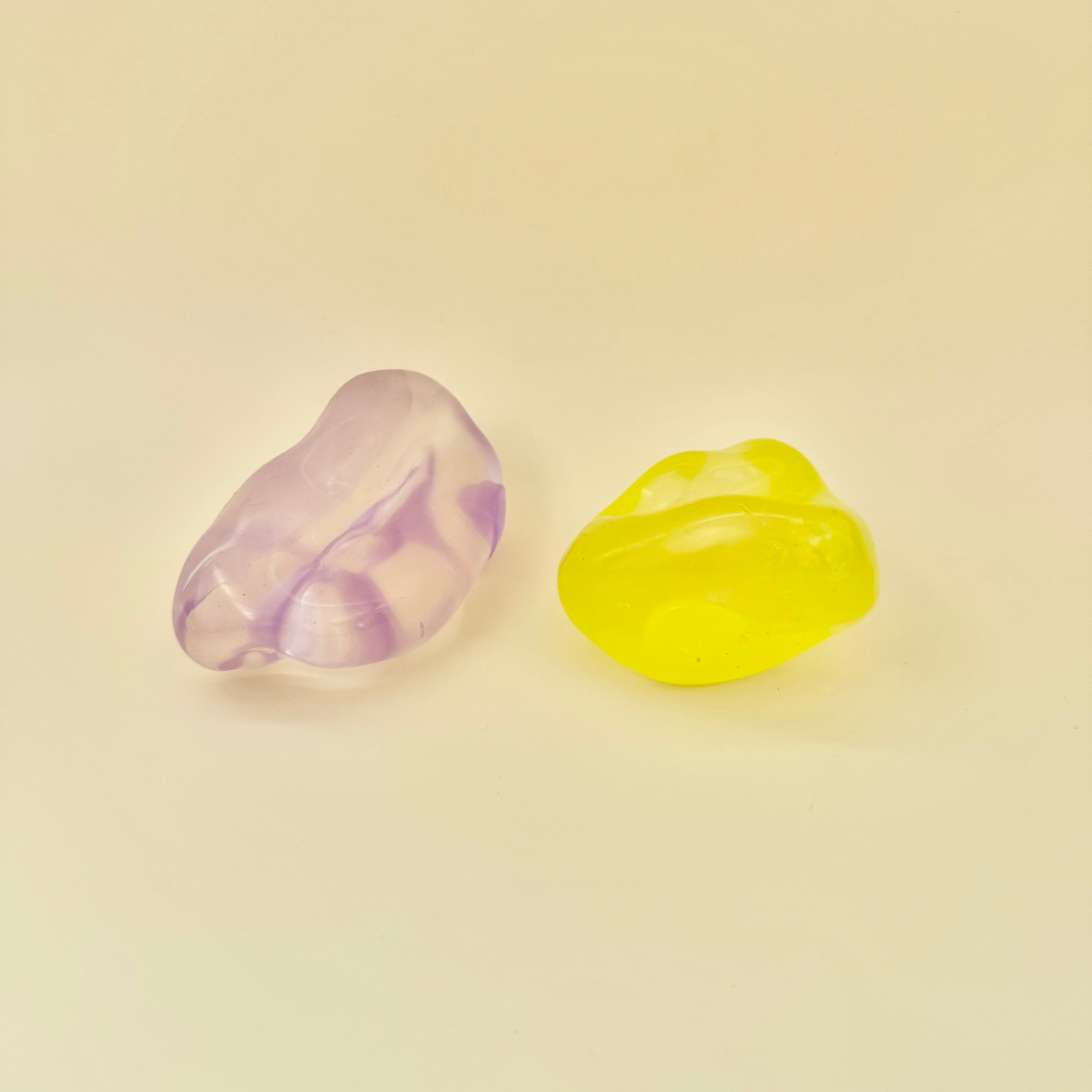 Soft smooth sensory squeeze toy for quiet desk resets and calming hand pressure during busy moments.