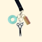 Tap-to-open keyring charm that triggers a chosen call, directions, link, or contact with one phone tap.
