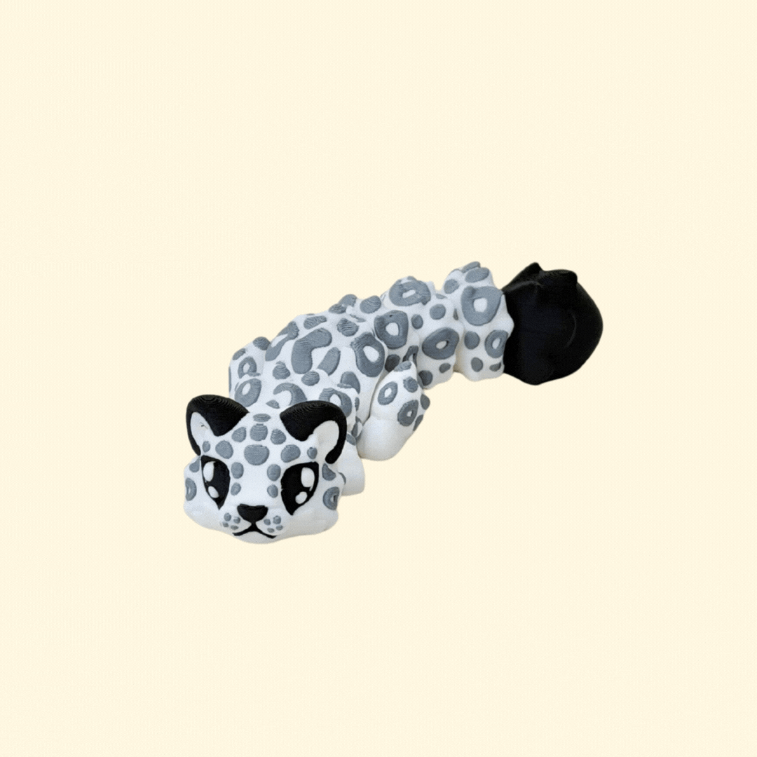 Fully articulated snow leopard fidget with textured details for tactile stimming, calming movement and sensory play.

