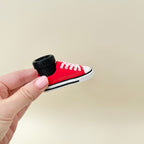 Compact trainer clicker fidget suitable for everyday carry and one-handed use.
