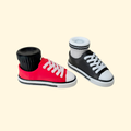 Trainer-shaped clicker fidget with pressable sock section and tactile click action.
