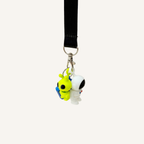 Portable space fidget charm for lanyards, bags and keys, designed for tactile feedback and focus support.