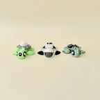 Mini articulated turtle fidgets with themed details for tactile play and collecting