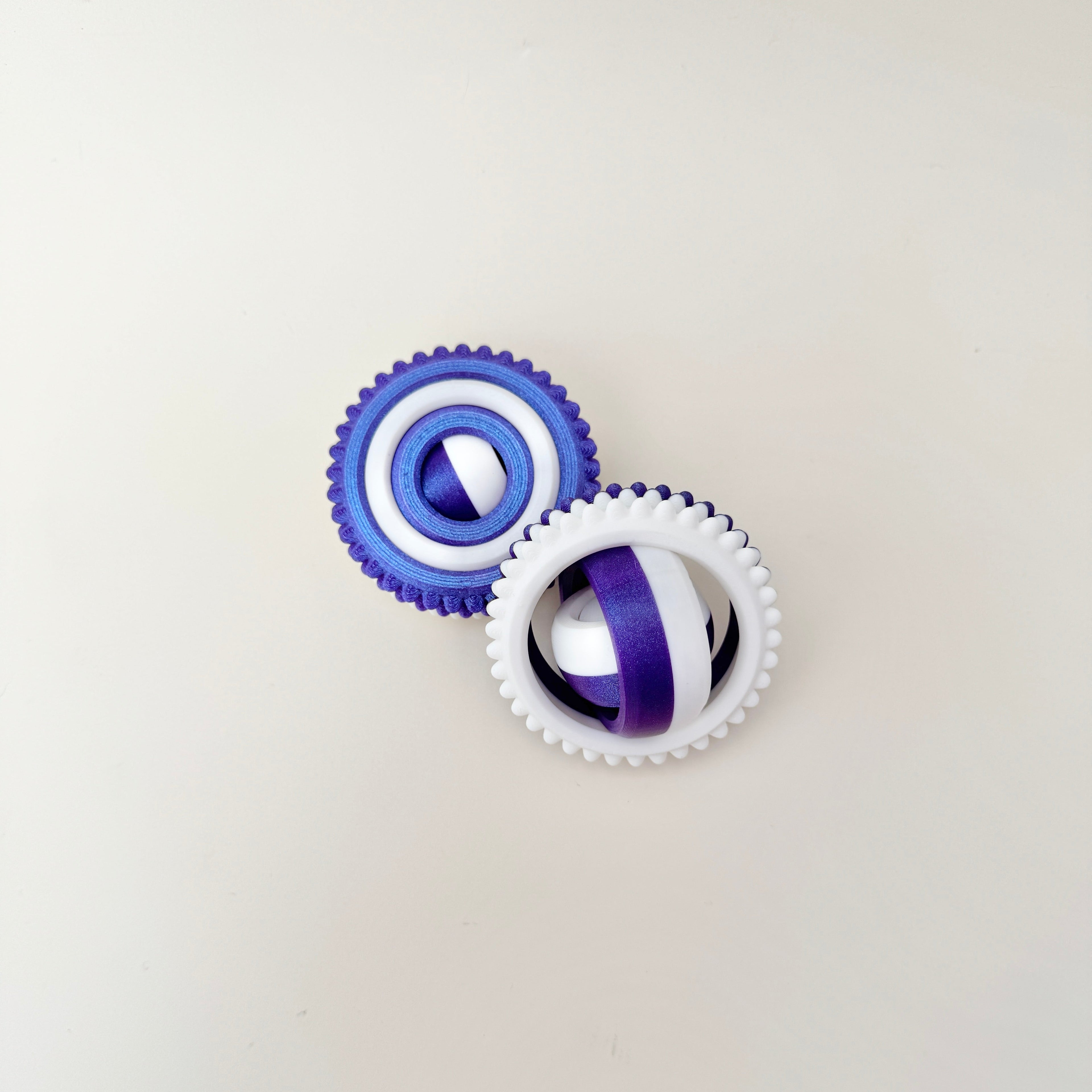 Bumpy-edge spinner for thumb tracing and movement.
