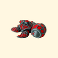 Mini turtle with a spider on its shell and cobweb design.