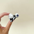 Articulated turtle fidget for sensory play.
